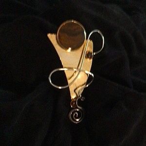 Modern art in a pin! Sterling silver, stones inset with polished gold metal